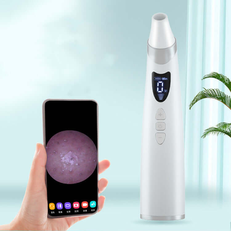 White electric blackhead suction instrument with LED display connected to a mobile app showing magnified skin pore image.