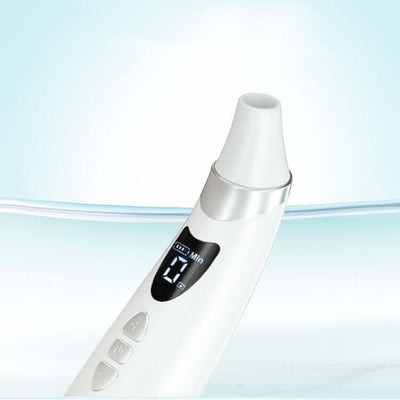 White electric blackhead suction instrument with LED display and silicone heads, for cleansing pores and skin care.