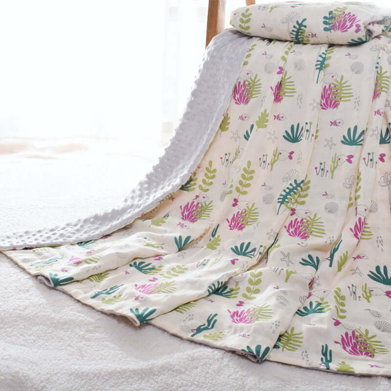 Baby blanket with colorful botanical pattern and 3D hot-pressed bubble design for sensory stimulation and comfort