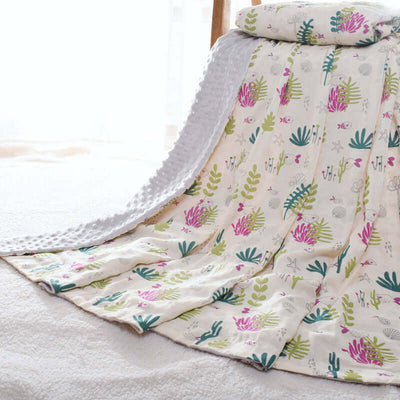 Baby blanket with colorful botanical pattern and 3D hot-pressed bubble design for sensory stimulation and comfort