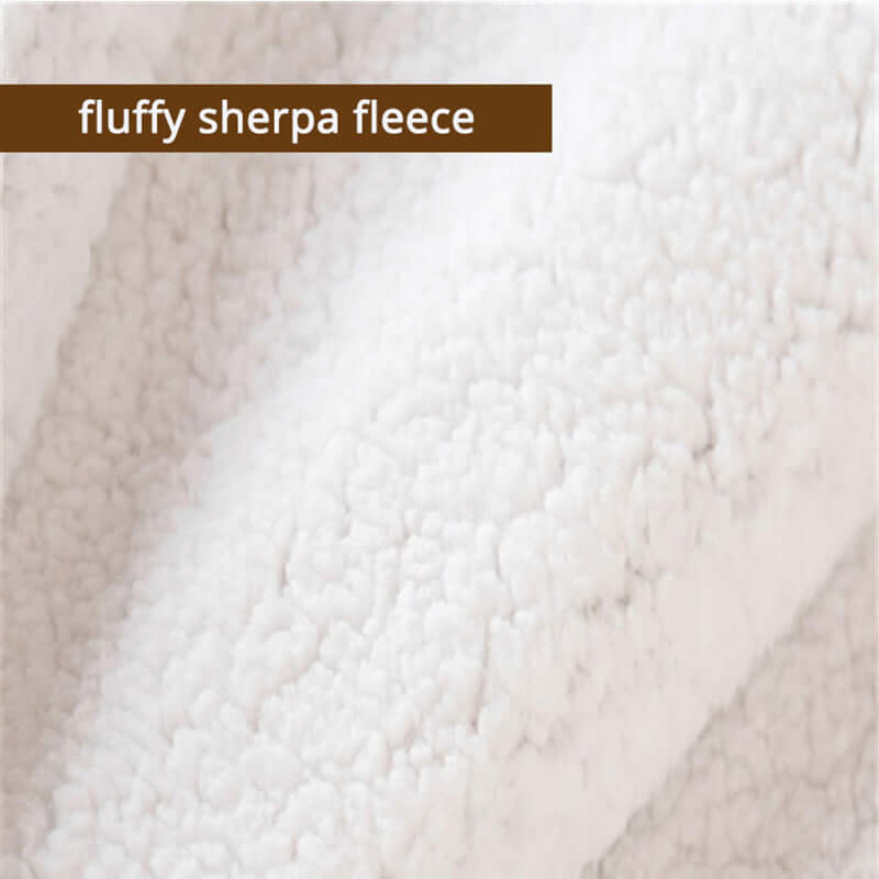 Close-up texture of a fluffy sherpa fleece blanket with "fluffy sherpa fleece" label, showcasing thick, soft fabric.