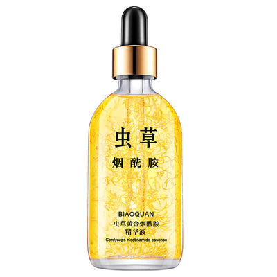 Firming and lifting skincare serum bottle with ginseng and Cordyceps essence, labeled in Chinese, showcasing golden liquid.